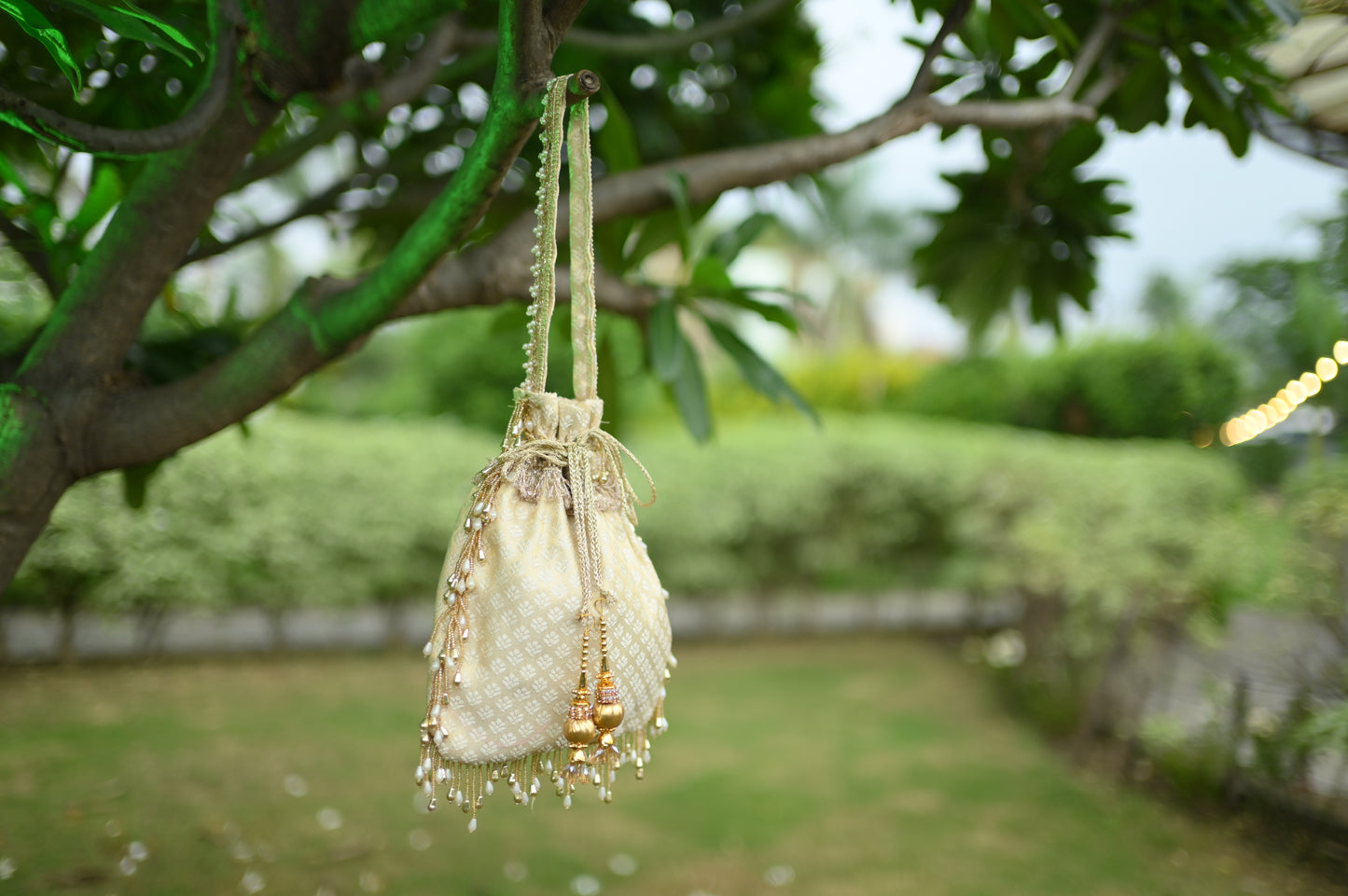 Ivory Pearl Drop Potli