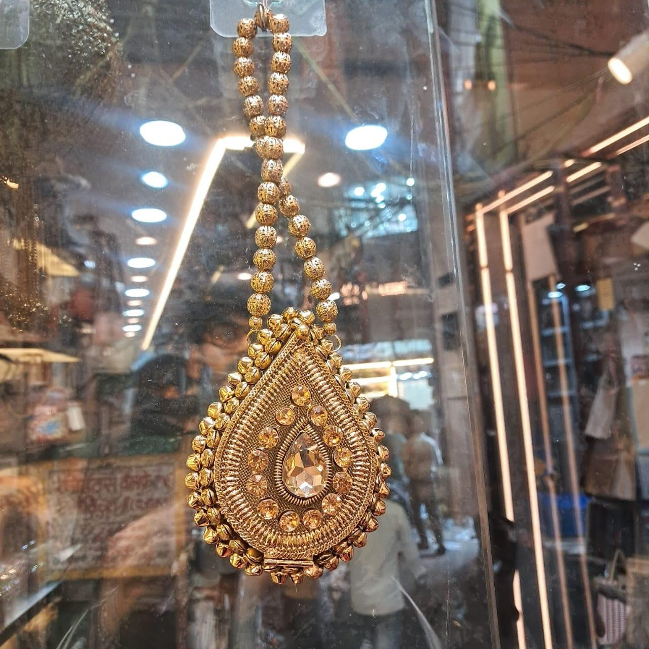 Golden Drop Potli Statement Bag