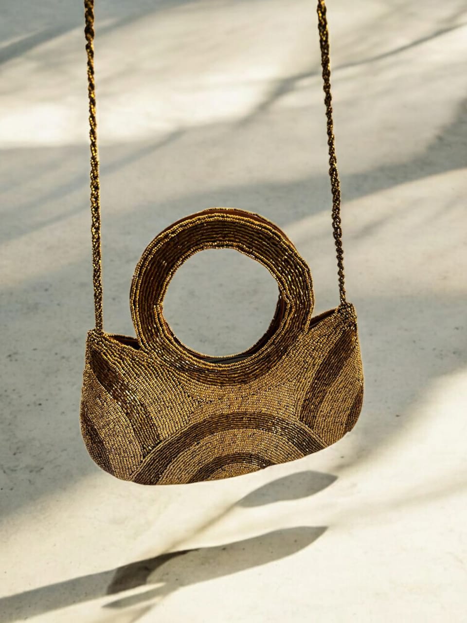 Golden Blossom Beaded Clutch".